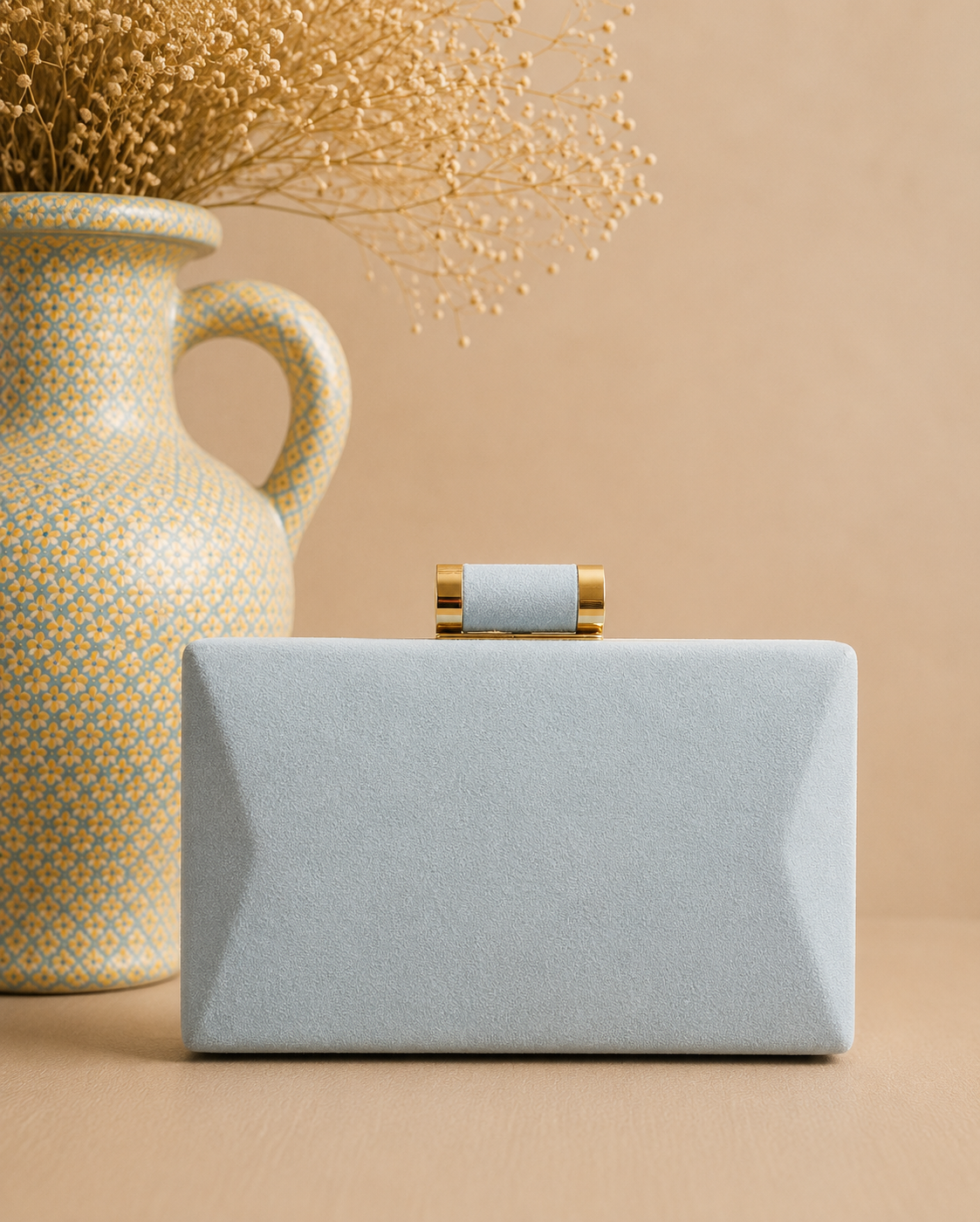 Clutch Alexandra. Celeste Empolvado.