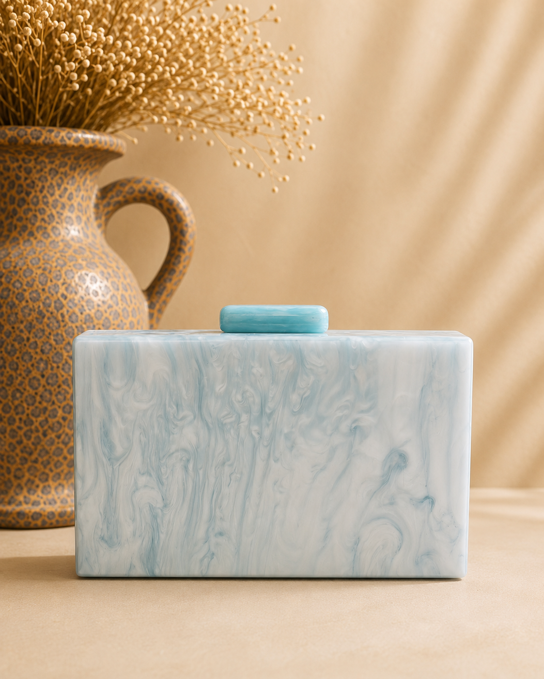 Clutch Verona. Azul Hielo Marmolado.