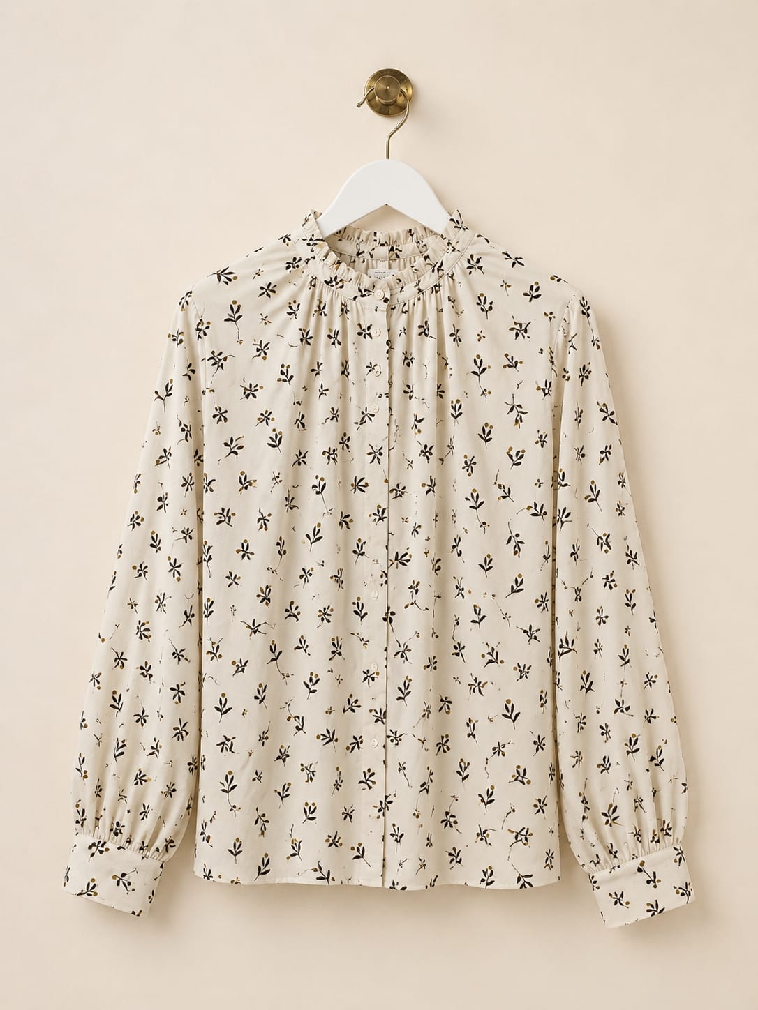 Blusa Elvira. Crema y detalles marrones.